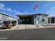House exterior with carport and golf cart at 650 N Hawes Rd # 3820, Mesa, AZ 85207