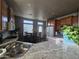 Kitchen with double sink, ample counter space, and wood cabinets at 650 N Hawes Rd # 3820, Mesa, AZ 85207
