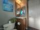 Bathroom featuring a vanity with wood cabinets and a toilet at 650 N Hawes Rd # 3820, Mesa, AZ 85207