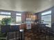 Spacious kitchen with wood cabinets, ample counter space, and a breakfast bar at 650 N Hawes Rd # 3820, Mesa, AZ 85207