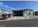 Attractive exterior of the home with a carport and golf cart at 650 N Hawes Rd # 3820, Mesa, AZ 85207