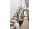 Modern staircase with metal railing leading to upper level at 4955 E Indian School Rd # 9, Phoenix, AZ 85018