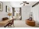 Home office featuring a workspace and comfortable seating at 4955 E Indian School Rd # 9, Phoenix, AZ 85018