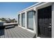 Private rooftop deck with city views and seating area at 4955 E Indian School Rd # 9, Phoenix, AZ 85018