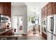 Modern kitchen with stainless steel appliances and breakfast bar at 4955 E Indian School Rd # 9, Phoenix, AZ 85018