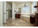 Primary bathroom with soaking tub, separate shower, and double vanity at 20447 N 266Th Ave, Buckeye, AZ 85396