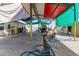 Covered carport with shade and car-washing setup at 2445 W Yuma St, Phoenix, AZ 85009