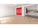 Bright living room with tile floors and red curtains at 2445 W Yuma St, Phoenix, AZ 85009