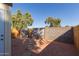 Backyard with a gate and stepping stones at 3646 N 69Th Ave # 60, Phoenix, AZ 85033