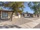 Front view of a triplex style building at 3646 N 69Th Ave # 60, Phoenix, AZ 85033
