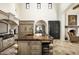 Spacious kitchen with a large island and custom cabinetry at 10493 E Rimrock Dr, Scottsdale, AZ 85255