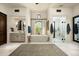 Spa-like bathroom with large bathtub, walk-in shower, and ample counter space at 10493 E Rimrock Dr, Scottsdale, AZ 85255