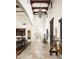 Grand entry with high ceilings, tiled floors, and ornate details at 10493 E Rimrock Dr, Scottsdale, AZ 85255