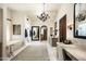 Luxurious bathroom with soaking tub, dual vanities, and walk-in shower at 10493 E Rimrock Dr, Scottsdale, AZ 85255