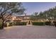 Elegant Spanish-style home with gated entry and courtyard at 10493 E Rimrock Dr, Scottsdale, AZ 85255