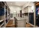 Large walk-in closet with ample shelving and drawer space at 10493 E Rimrock Dr, Scottsdale, AZ 85255