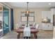 Casual dining area with sliding glass doors to backyard at 20461 W Briarwood Dr, Buckeye, AZ 85396