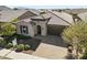 Single story home with a welcoming front yard at 20461 W Briarwood Dr, Buckeye, AZ 85396