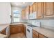 Bright kitchen with ample cabinetry, and modern appliances at 7300 N 51St Ave # D212, Glendale, AZ 85301