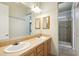 Double vanity bathroom with ample storage and mirror at 7300 N 51St Ave # D212, Glendale, AZ 85301