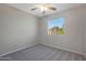 Bright bedroom with window and ceiling fan at 19826 N 11 St, Phoenix, AZ 85024