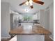 Kitchen with granite countertop island and stainless steel appliances at 19826 N 11 St, Phoenix, AZ 85024