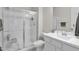 Clean bathroom with a walk-in shower, toilet, and vanity at 7056 N 85Th Ave Ave, Glendale, AZ 85305