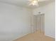 Well-lit bedroom featuring a ceiling fan and carpet at 2402 E 5Th St # 1429, Tempe, AZ 85288