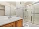 Bathroom with wood cabinets, shower and toilet at 2402 E 5Th St # 1429, Tempe, AZ 85288