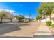 Gated community entrance with paved streets at 2402 E 5Th St # 1429, Tempe, AZ 85288