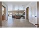 Spacious entryway with tile flooring and views into the living room and kitchen at 11110 N 165Th Ave, Surprise, AZ 85388