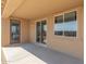 Covered patio with sliding glass doors and a view of the backyard at 18156 W Cielo Grande Ave, Surprise, AZ 85387