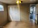 Bright bedroom with double door closet and laminate floor at 2460 E Main St # A17, Mesa, AZ 85213