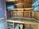 Well-lit workshop with built-in shelving and work bench at 2460 E Main St # A17, Mesa, AZ 85213