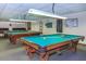 Community billiards room with multiple tables at 2460 E Main St # A17, Mesa, AZ 85213