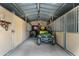Barn with multiple stalls and two utility vehicles at 39839 N Spur Cross Rd, Cave Creek, AZ 85331