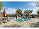 Sparkling pool with patio furniture and mountain views in the background at 39839 N Spur Cross Rd, Cave Creek, AZ 85331