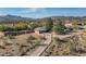 Aerial view of a ranch style home with pool and mountain views at 39839 N Spur Cross Rd, Cave Creek, AZ 85331