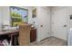 Home office with built-in desk and view from window at 39839 N Spur Cross Rd, Cave Creek, AZ 85331