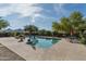 Inviting swimming pool with a spacious deck and mountain views at 39839 N Spur Cross Rd, Cave Creek, AZ 85331
