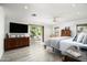 Spacious main bedroom with wood floors and access to backyard at 39839 N Spur Cross Rd, Cave Creek, AZ 85331