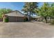 Two-car garage and charming single story home exterior at 39839 N Spur Cross Rd, Cave Creek, AZ 85331