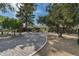 Brick house with a large paved driveway and mature landscaping at 39839 N Spur Cross Rd, Cave Creek, AZ 85331