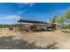 Metal framed tack room with covered area at 39839 N Spur Cross Rd, Cave Creek, AZ 85331