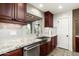 Kitchen with granite countertops, stainless steel sink and dishwasher at 39839 N Spur Cross Rd, Cave Creek, AZ 85331