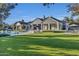 Luxury home with expansive backyard, pool, and lush landscaping at 20445 E Sunset Ct, Queen Creek, AZ 85142