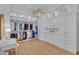 Spacious walk-in closet with custom shelving and vanity at 20445 E Sunset Ct, Queen Creek, AZ 85142