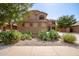 Two story house with a large driveway and landscaping at 43499 W Courtney Dr, Maricopa, AZ 85138