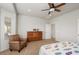 Spacious bedroom with dresser and comfortable seating at 20712 N 273Rd Ave, Buckeye, AZ 85396