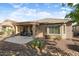 Backyard view of house with patio and landscaping at 20712 N 273Rd Ave, Buckeye, AZ 85396